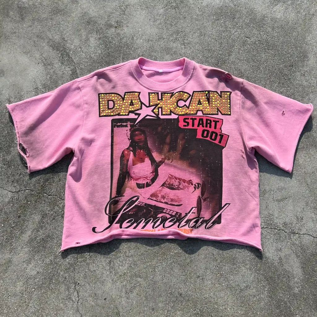 Flat lay of custom rhinestone distressed t-shirt showing oversized fit and raw hem.